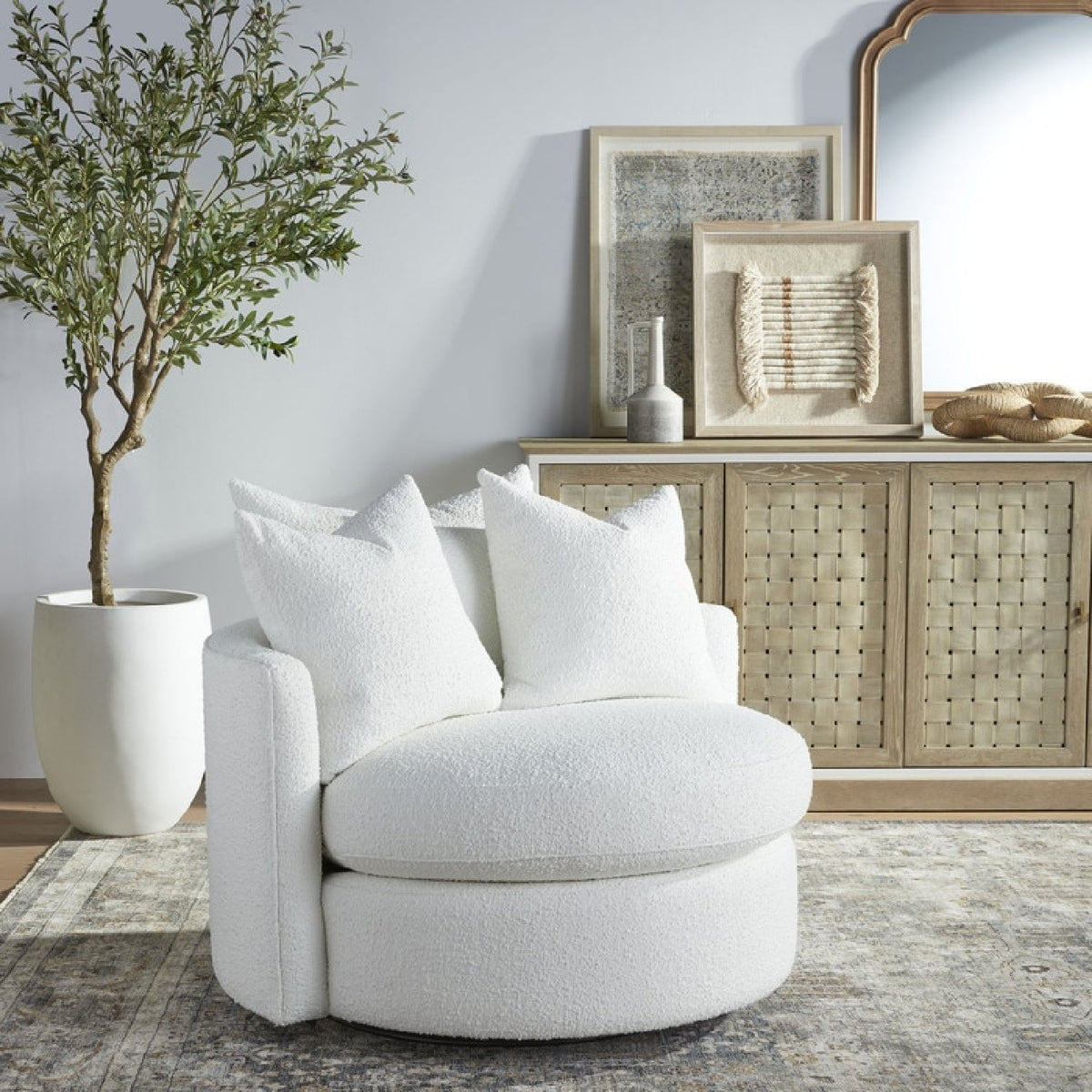 Round Petite Swivel Sofa | Living Essentials Lourne