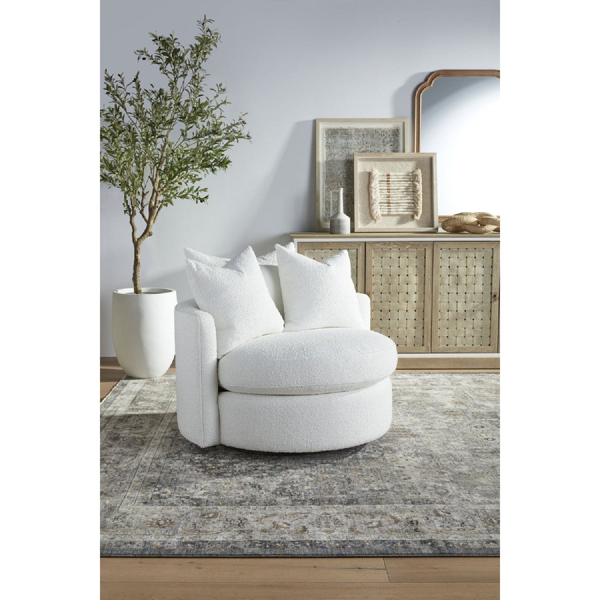 Round Petite Swivel Sofa | Living Essentials Lourne